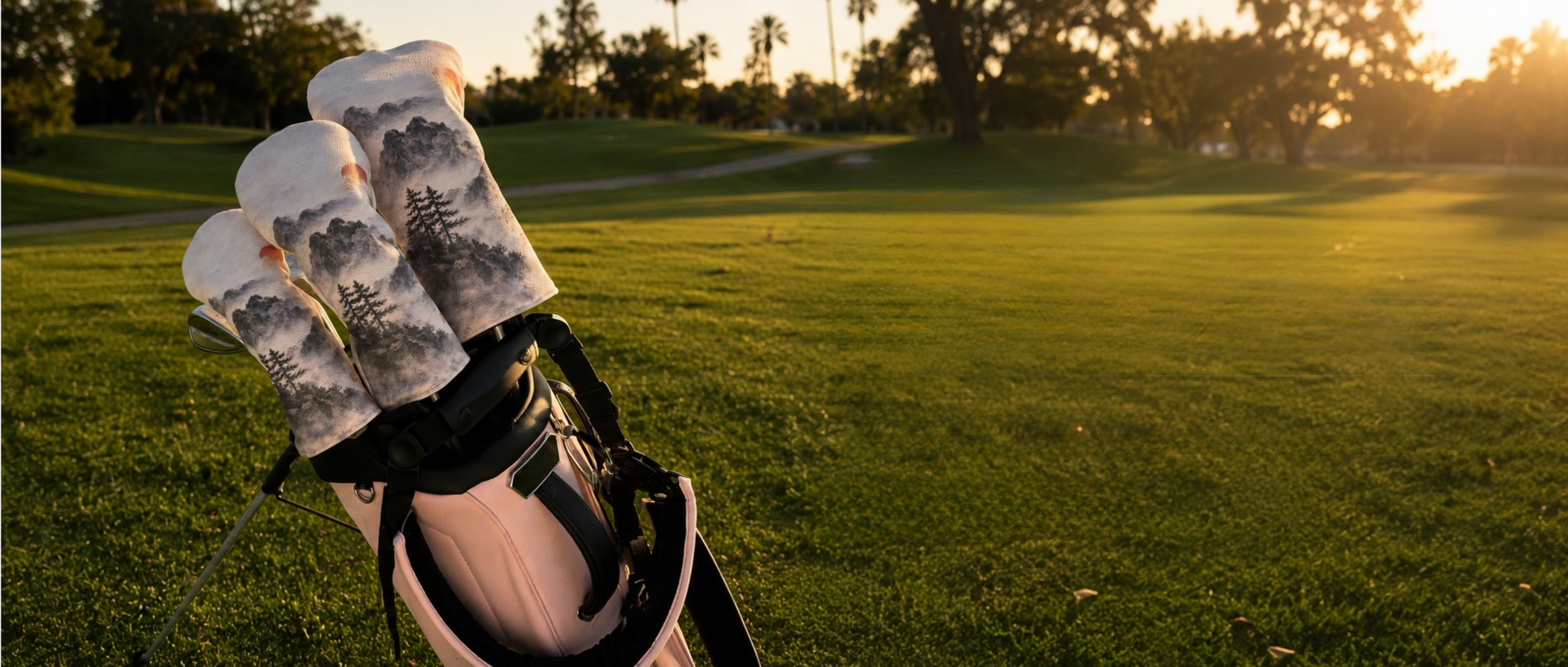 Funday Golf head covers on a golf bag at sunset